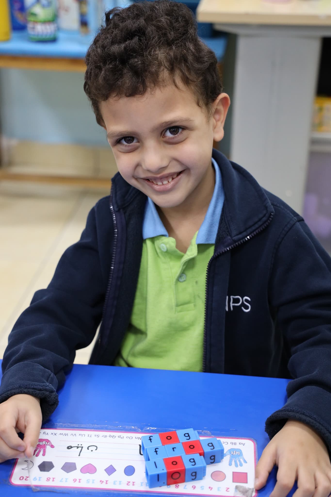 A child participating confidently in a classroom activity