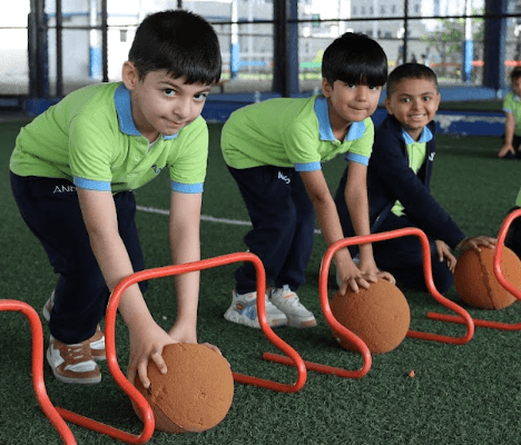 Kindergarten children enjoying outdoor play and movement