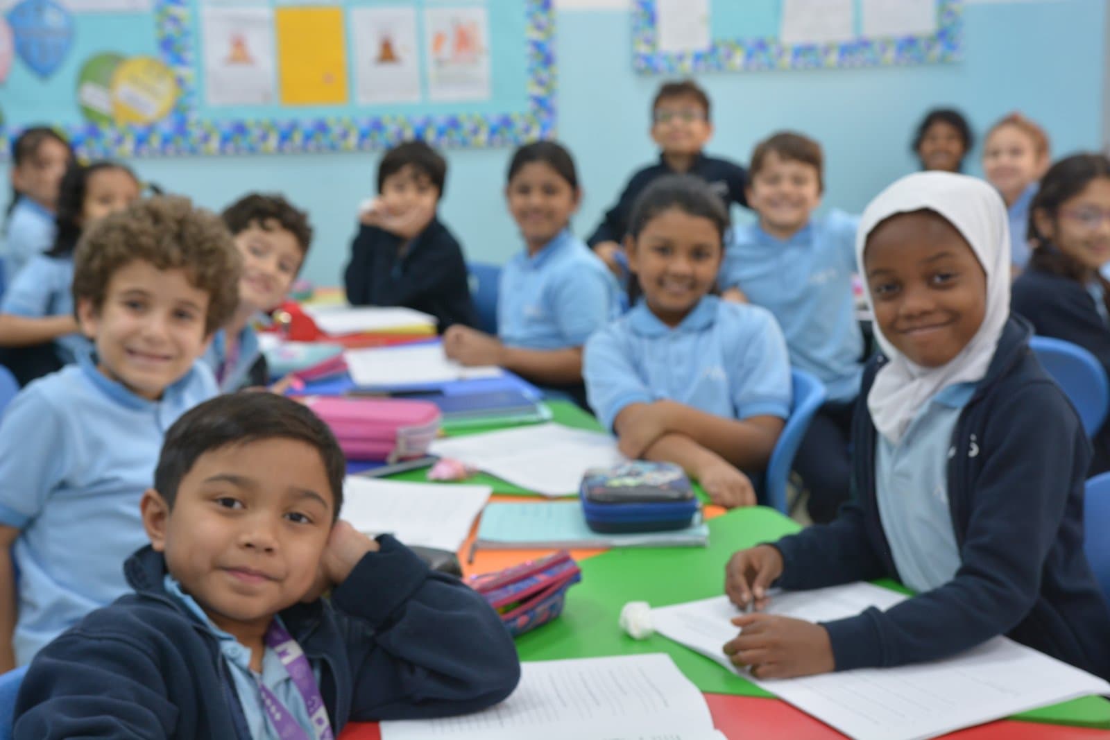 Primary students taking part in a school assembly